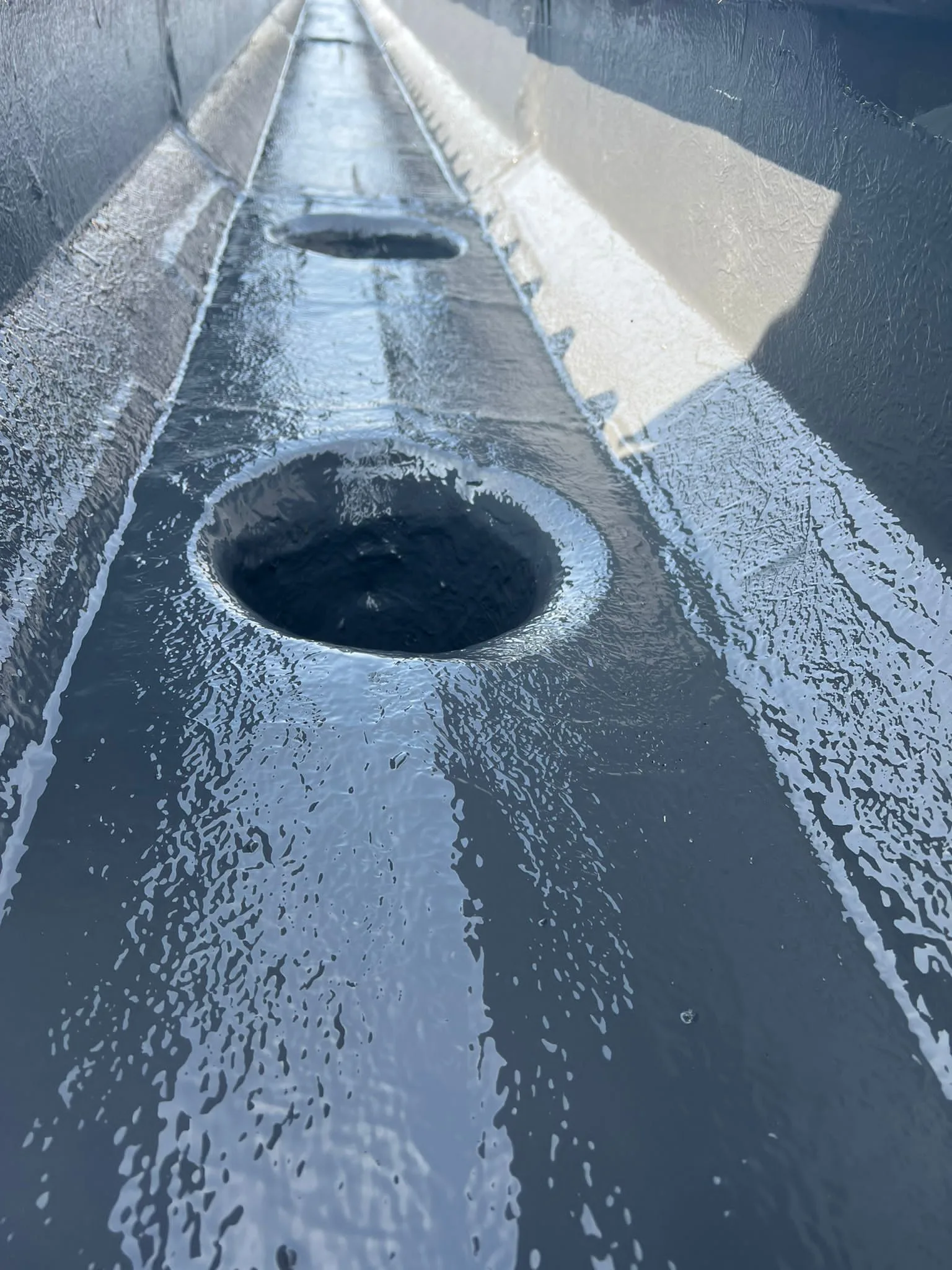 FLEXITEC liquid roofing system installed on a completed roof