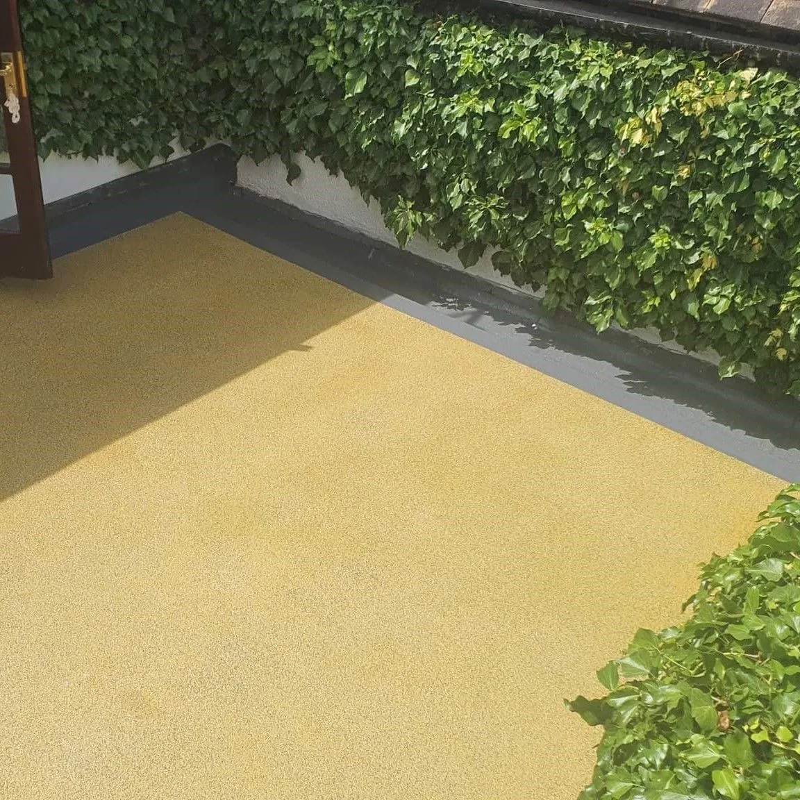 FLEXITEC liquid roofing system installed on a completed roof