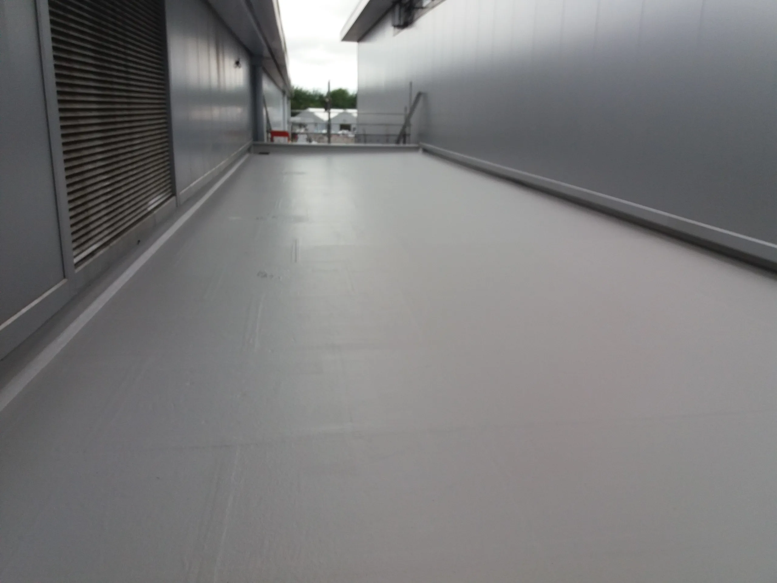 FLEXITEC liquid roofing system installed on a completed roof