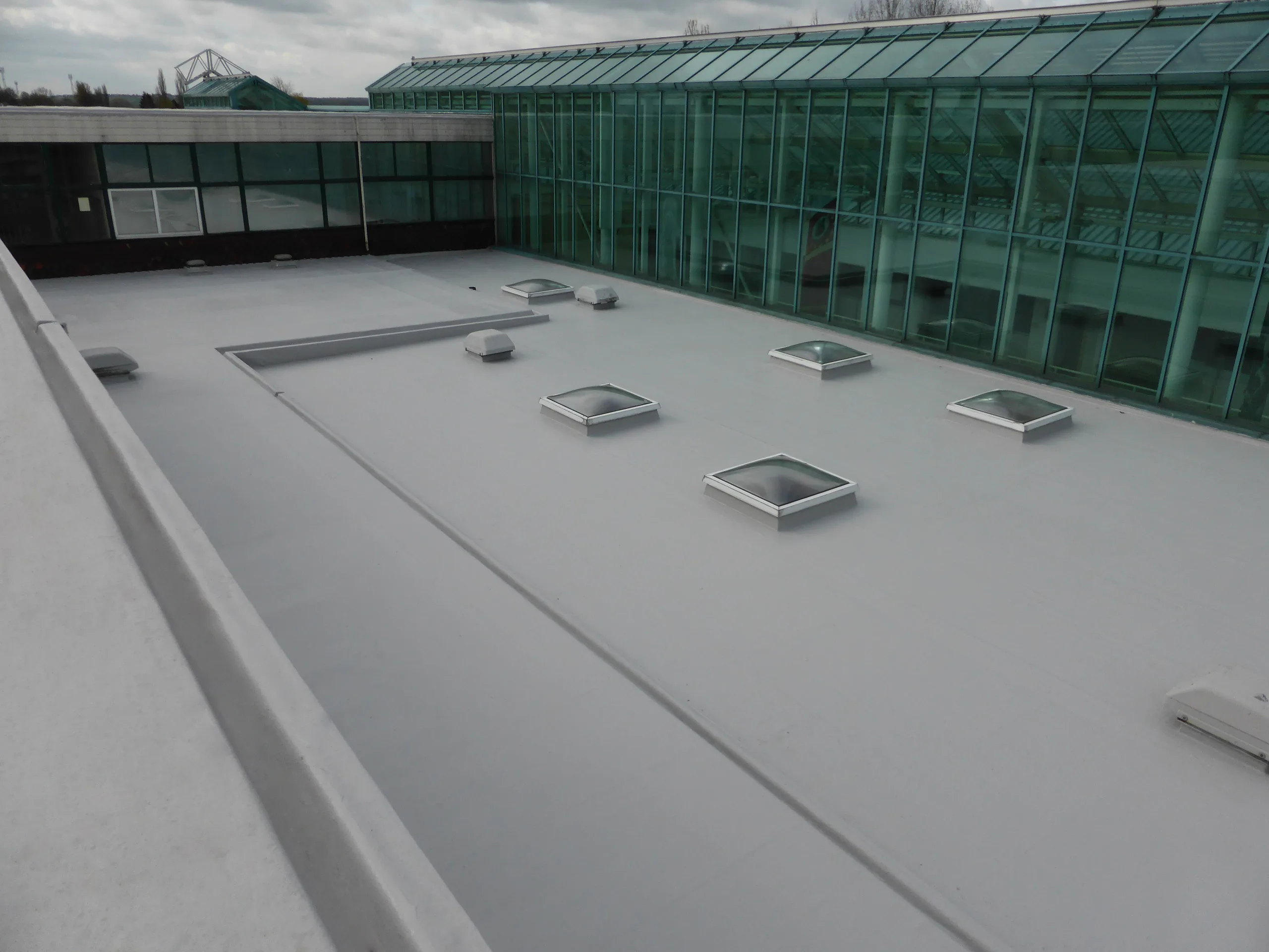FLEXITEC liquid roofing system installed on a completed roof