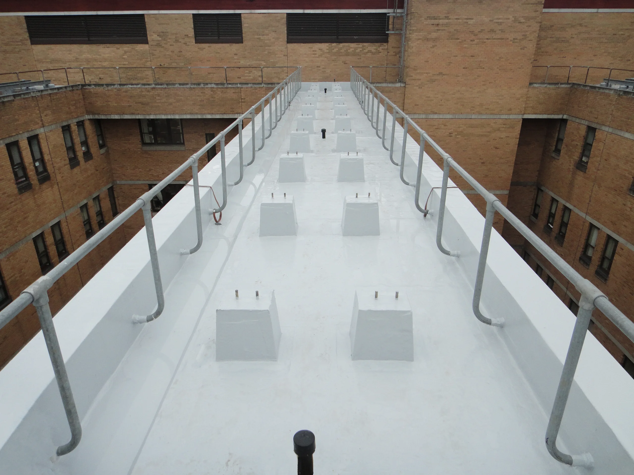 FLEXITEC liquid roofing system installed on a completed roof