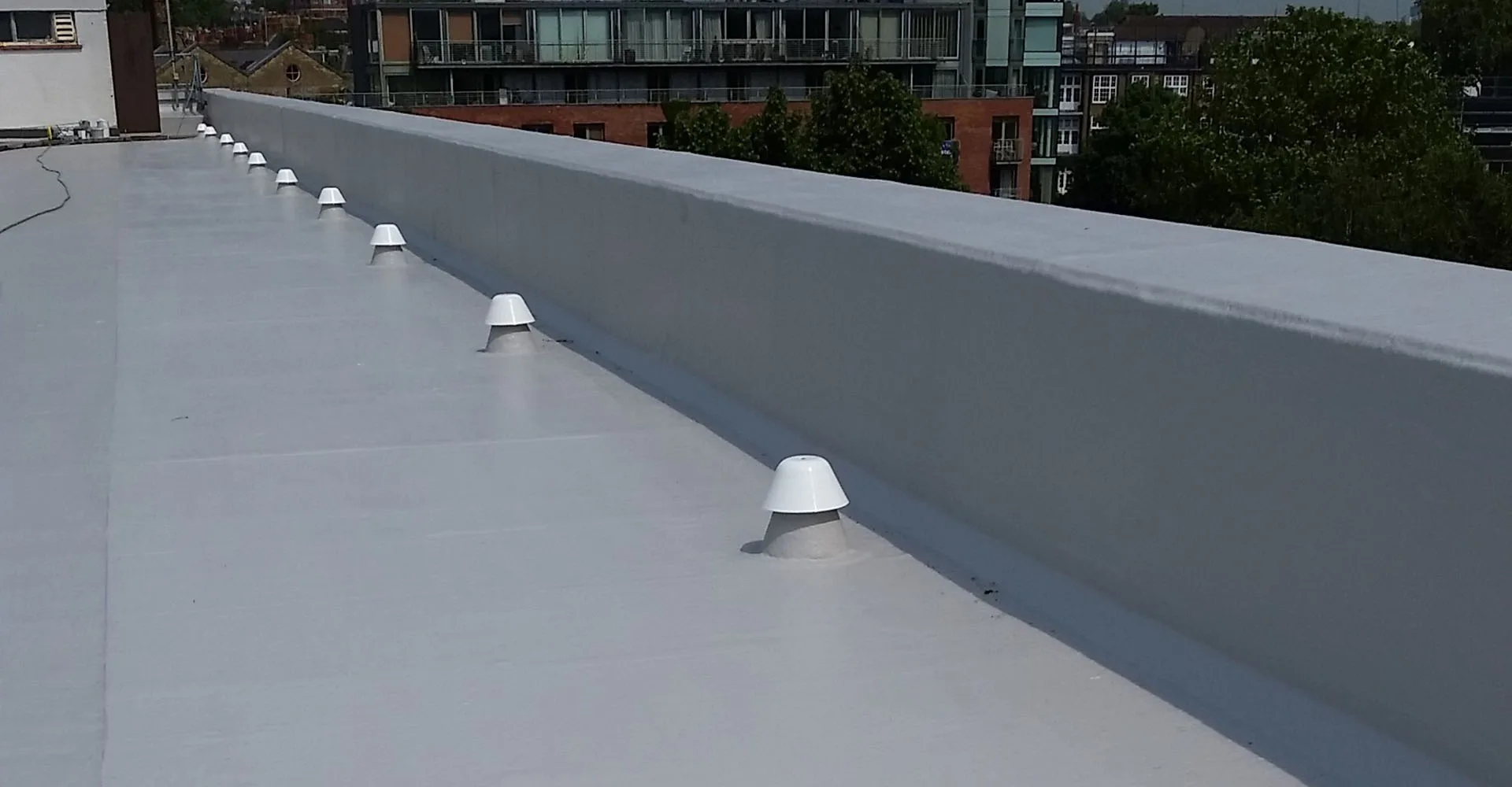 FLEXITEC liquid roofing system installed on a completed roof